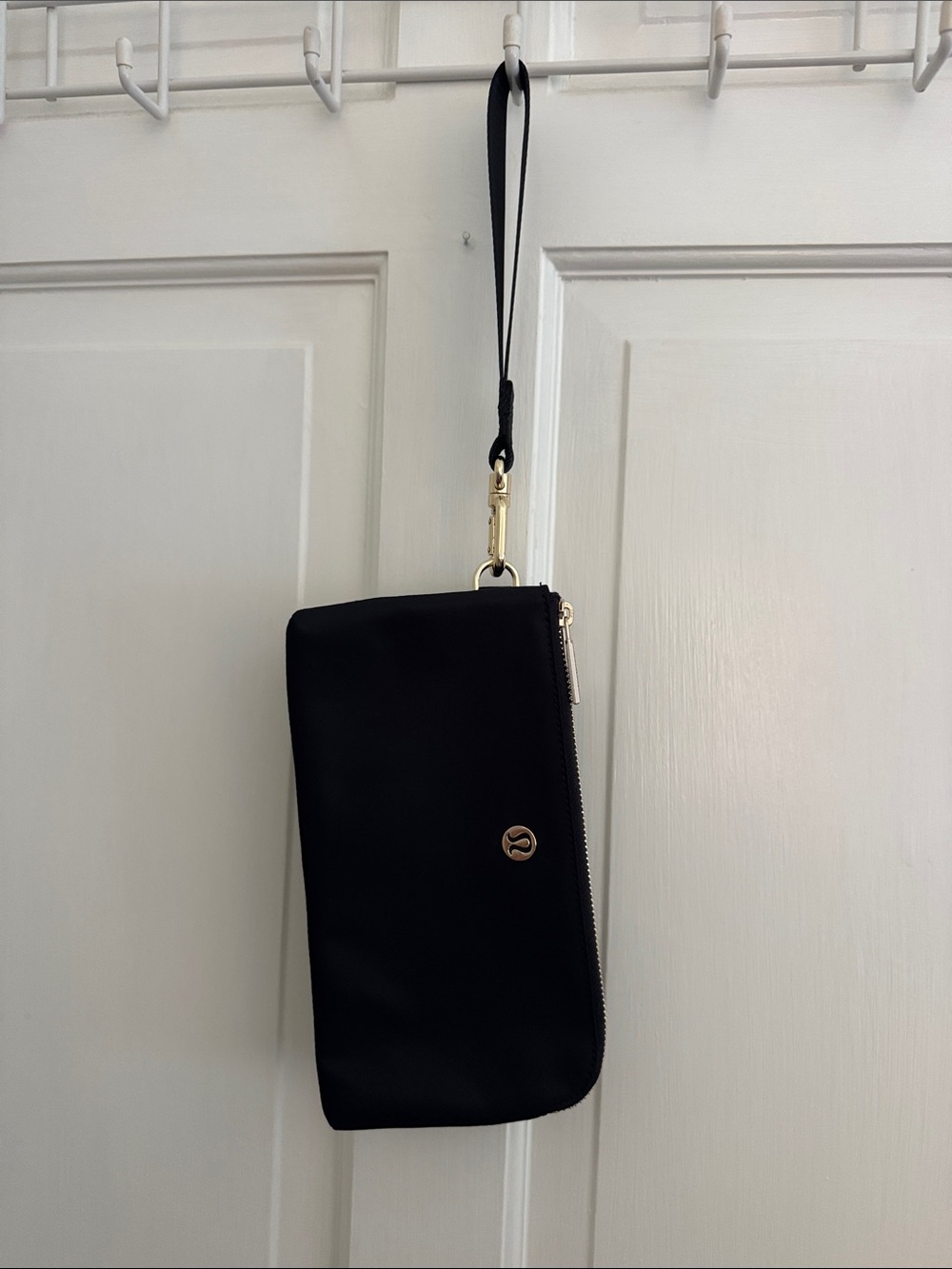 lululemon athletica Black Wristlet with Gold Hardware